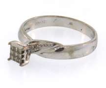 Pretty 14k white gold ring with princess cut diamonds