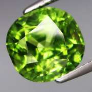 Superb 4.39ct cushion cut apple green Peridot