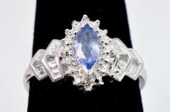 Sparkling Purple Gemstone Ring in White gold with Diamonds