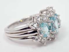 Bright Blue Crystals Set in Sterling Silver Ring With White Crystal Accents