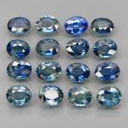 Heated only! 3.89ct blue green Sapphire set
