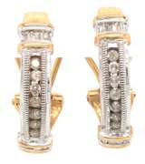 14k two tone ladies diamond earrings.
