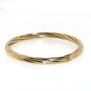 Stylish 14kt Yellow Gold Twisted Bangle