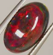 Glistening 3.11ct fiery flashing Welo Black Opal