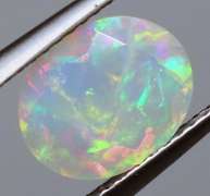 Highly expressive full floral 1.48ct faceted Jelly Opal