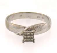 Pretty 14k white gold ring with princess cut diamonds