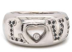 LADIES 18 KT WHITE GOLD DIAMOND 'LOVE' RING.