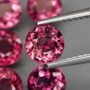 Ravishing 6.51ct rich pinkish violet Rhodolite Garnet set