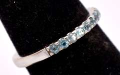 Brilliant Ladies Band Style Ring with Aquamarine Gemstones in 18K White Gold