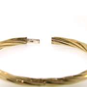 Stylish 14kt Yellow Gold Twisted Bangle