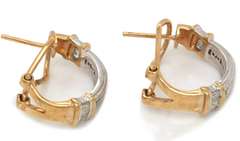 14k two tone ladies diamond earrings.