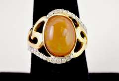 Fabulous 2.57CTS Ethiopian Opal Set in Gold Plated Sterling Silver Ring With .26CTW of Accenting Diamonds