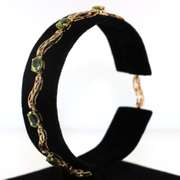 Fashionable Peridot Gold Link Bracelet