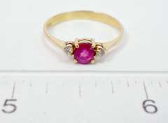 Lovely Oval Cut Ruby Set in 18K Yellow Gold Diamond Ring