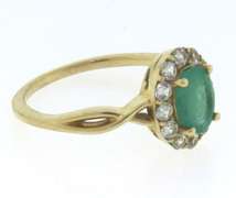 Oval Cut Emerald and CZ Ring in Yellow Gold