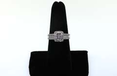 14kt White Gold Cluster Ring with round and baguette Diamonds