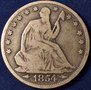 1854 Seated Liberty Half Dollar Arrows, Circulated.