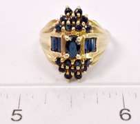 Fantastic Gallery of Blue Sapphires Set in Intricate Yellow Gold Ladies Ring