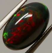 Glistening 3.11ct fiery flashing Welo Black Opal
