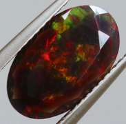 Glistening 2.01ct fiery flashing Welo Black Opal