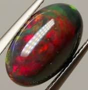 Glistening 3.11ct fiery flashing Welo Black Opal