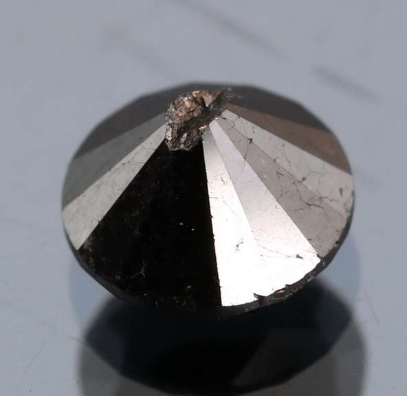 Elegant 1.37ct smooth cut Black Diamond solitaire