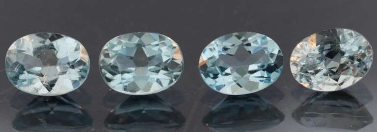 Heavy 6.30ct vivid sky blue Topaz set