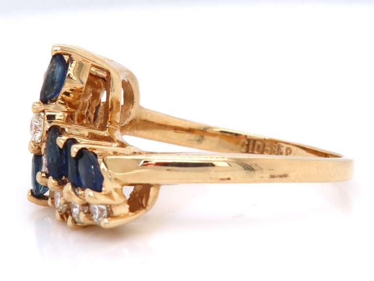 Powerful Marquise Sapphire and Diamond Bypass Ring