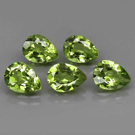 Dazzling 6.17ct untreated apple green Peridot set