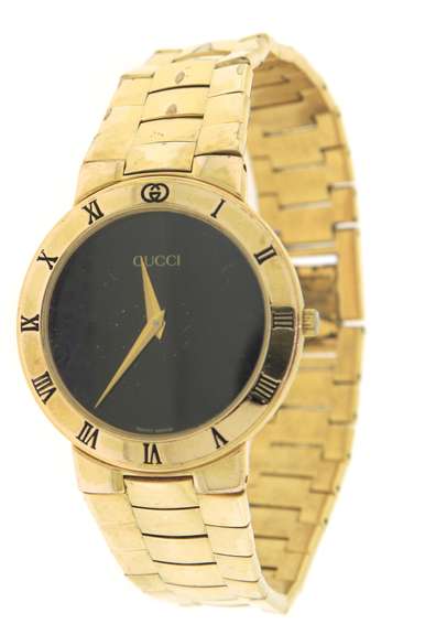 Gucci Gold Plated Black Dial Watch