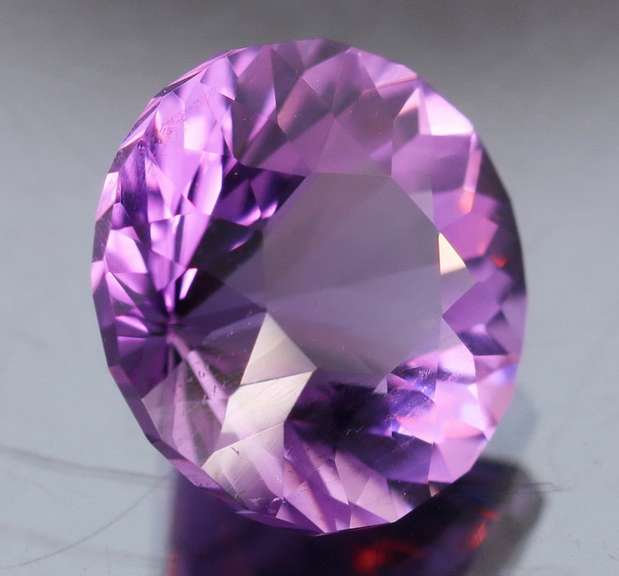 Exceptional 5.9ct color shifting Amethyst solitaire