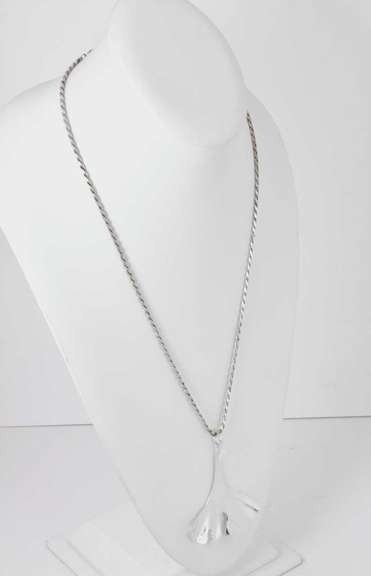 Sterling Silver Tail Shaped Necklace.