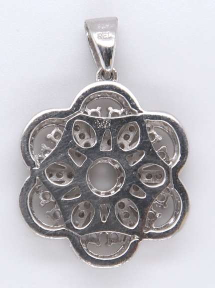 Flower Shaped Sterling Silver Pendant with Cubic Zirconias
