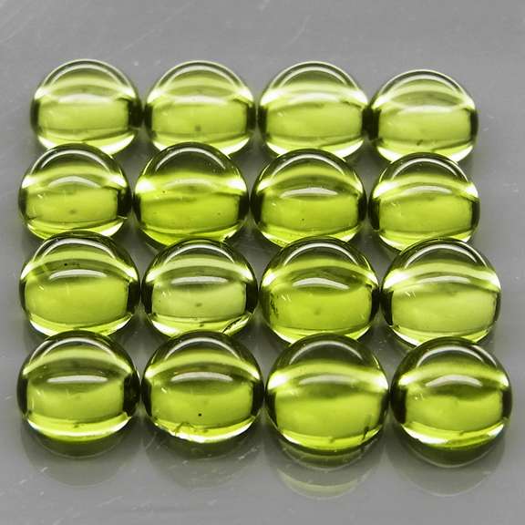 Pristine 10.73ct 16pc lime green Peridot set