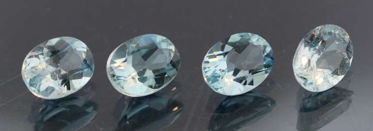 Heavy 6.30ct vivid sky blue Topaz set