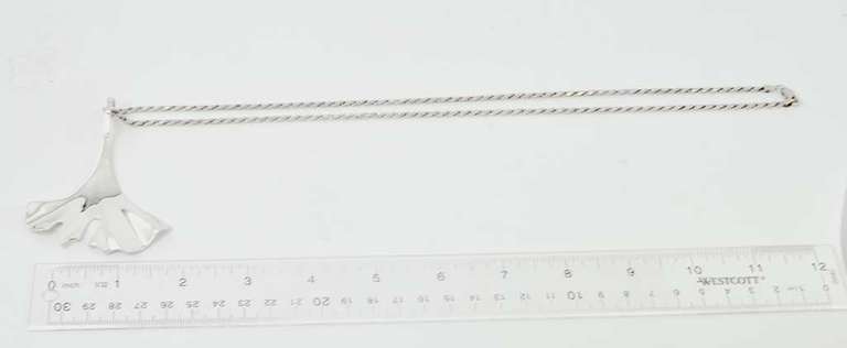 Sterling Silver Tail Shaped Necklace.