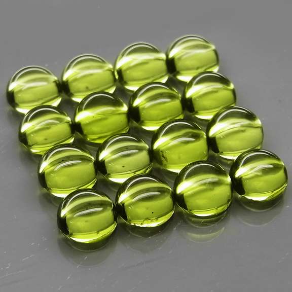 Pristine 10.73ct 16pc lime green Peridot set