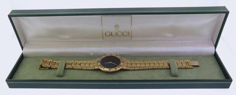 Gucci Gold Plated Black Dial Watch