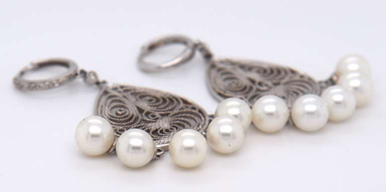 6MM CULTURED PEARL AND DIAMOND CHANDELIER EARRINGS.