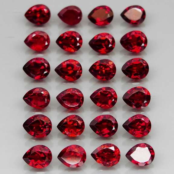 Incredible 10.09ct open color matched Garnet set