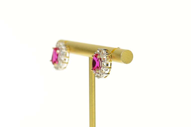 10K Yellow Gold Oval Syn. Ruby CZ Halo Classic Screw Back Earrings