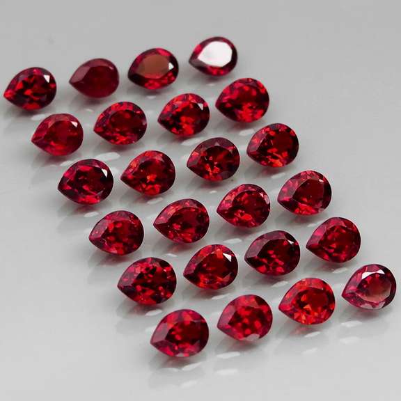 Incredible 10.09ct open color matched Garnet set