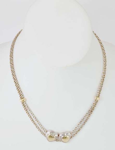 Sterling Silver Heart Necklace With Gold Plated Hearts.