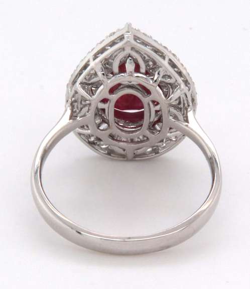 Mesmerizing 18k Stamped White Gold Ruby Teardrop Ring rimmed with Sparkling Diamonds