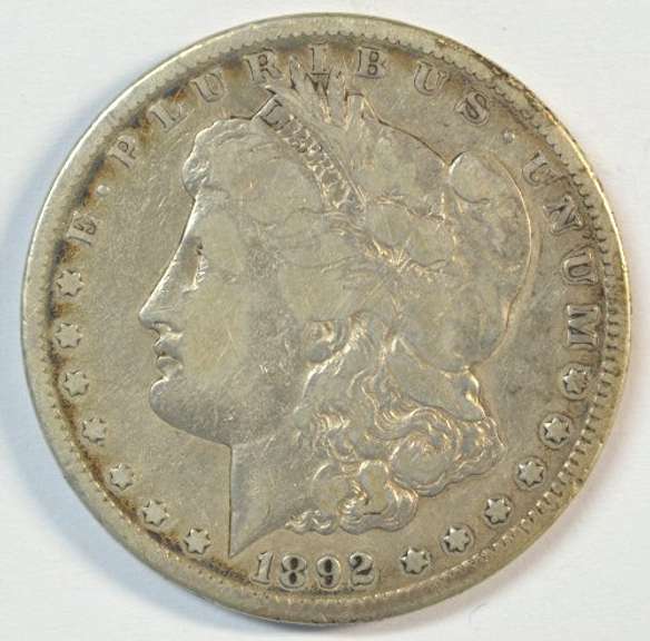 Key date 1892-CC Morgan Silver Dollar in nice circ