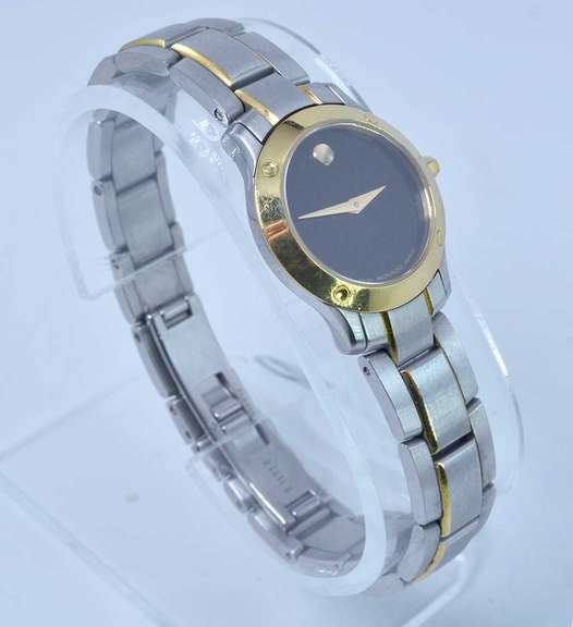 Movado Black Dial 18k Gold Bezel. Pre-Owned.