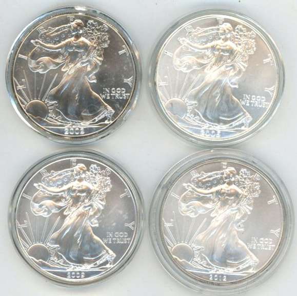 4 diff. Superb Gem BU $1 American Silver Eagles in Capsules