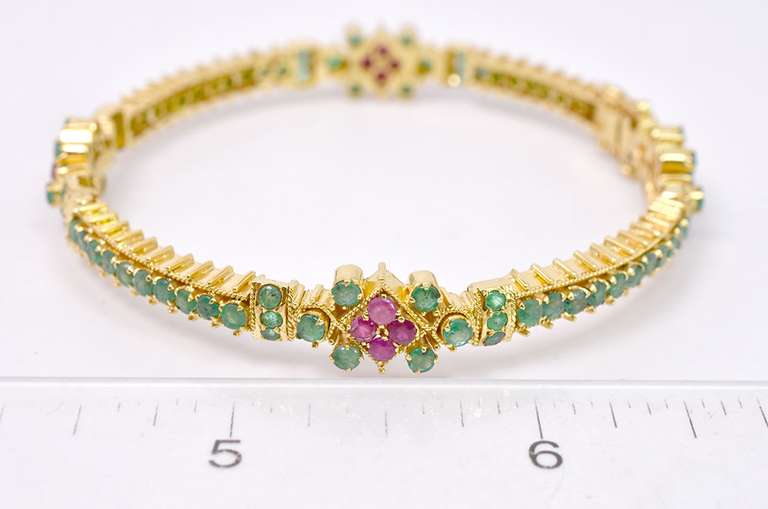 Extravagant Ruby and Emerald Bracelet in 18K Yellow Gold