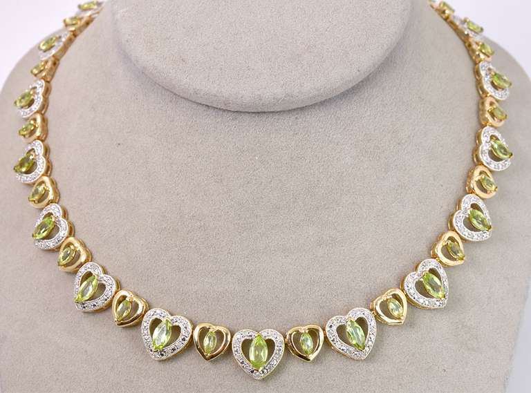 Darling Heart Design Necklace with 13.53CTW Marquise Cut Peridot Gemstones with 2.17CTW Accenting Diamonds