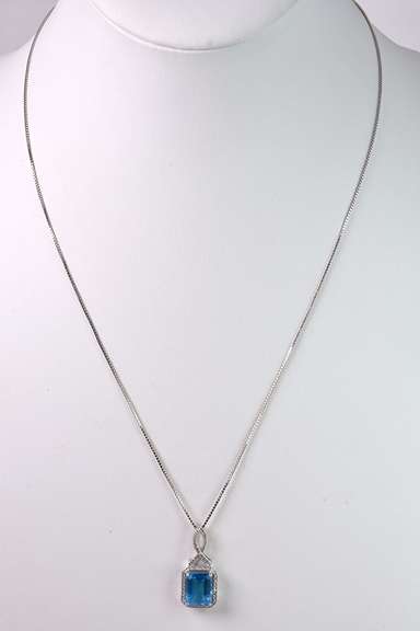 Magnificent Emerald Cut Blue Topaz in 14k White Gold with Diamonds